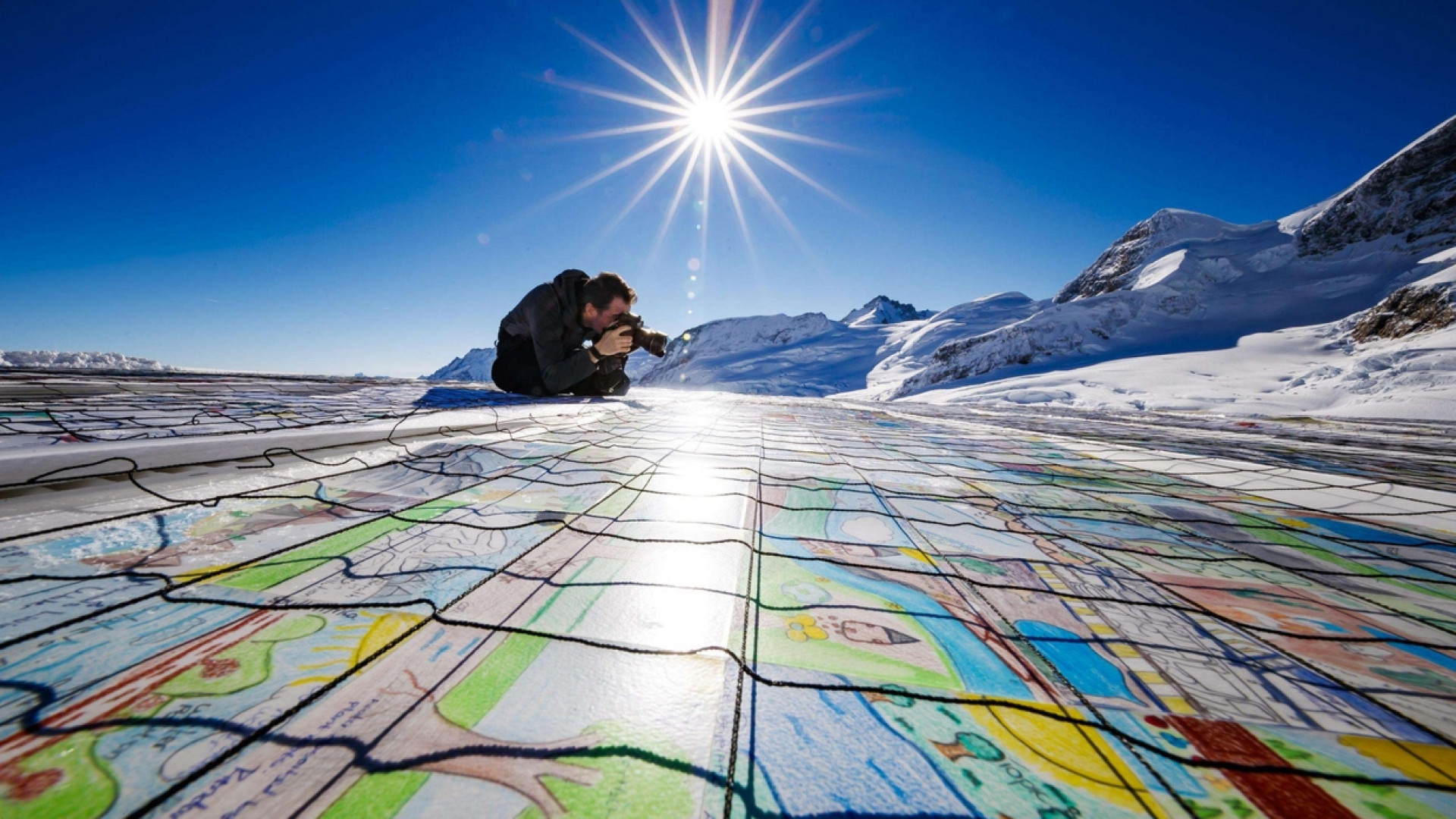 Mosaico da record coi disegni dei bambini per dire stop al riscaldamento globale