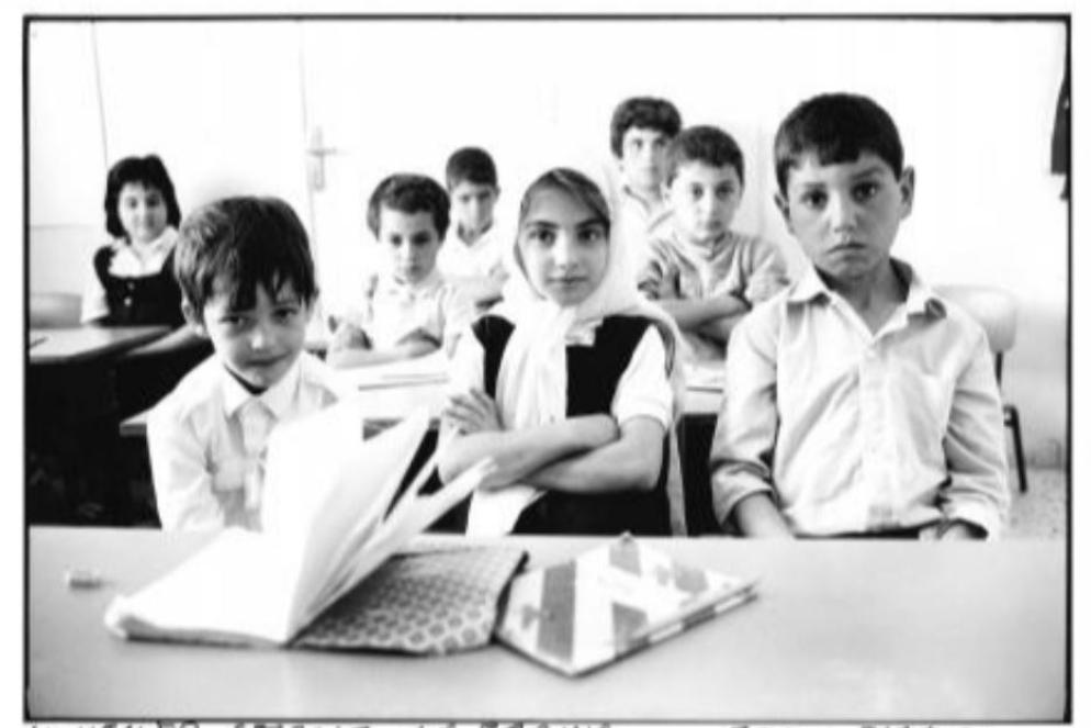 “Il vento sfoglia le pagine”, scattata in Cisgiordania. - Tano D’Amico